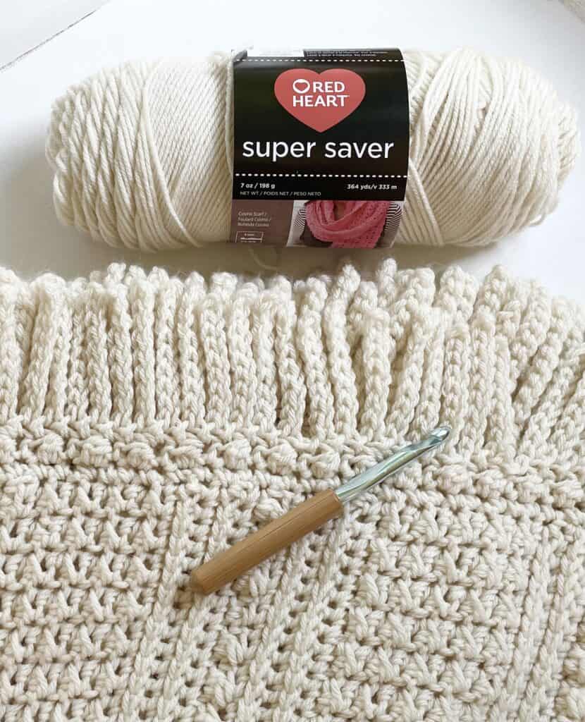 crochet blanket, yarn skein, crochet hook