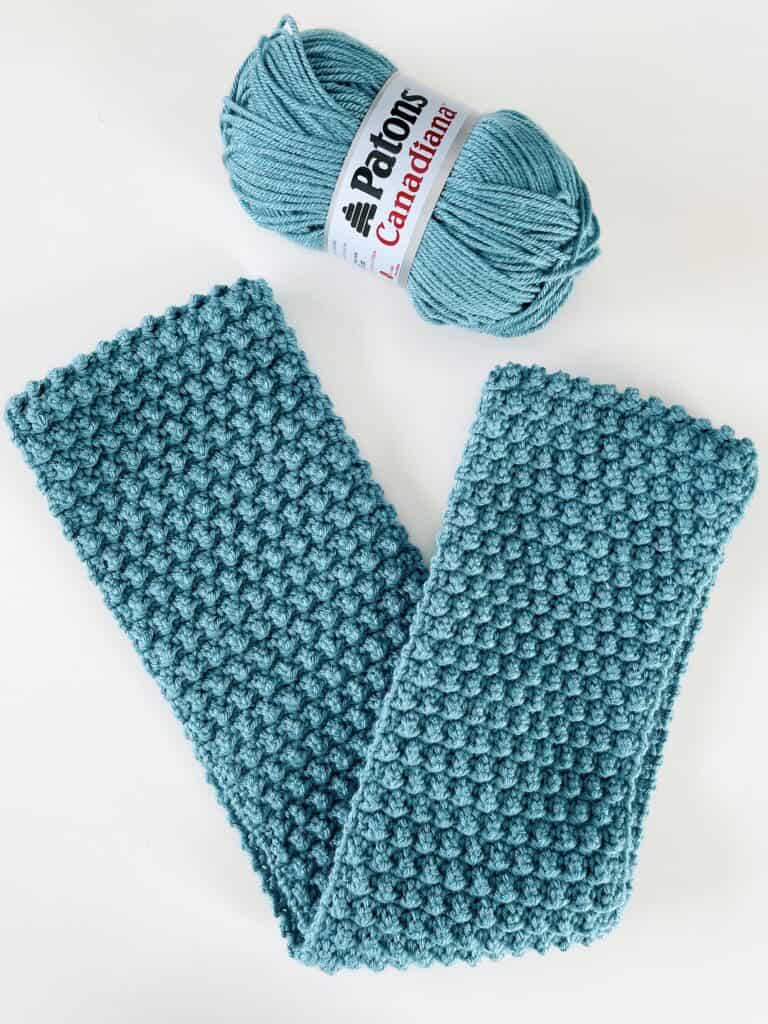blue scarf, blue yarn skein