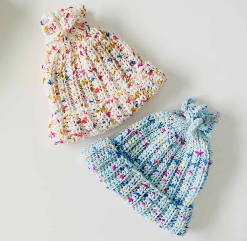two crochet beanies
