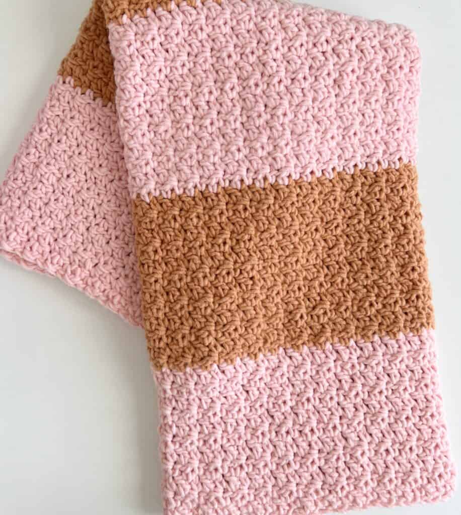 flat lay of crochet blanket
