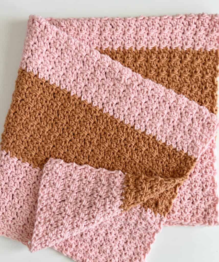 pink and gold crochet blanket