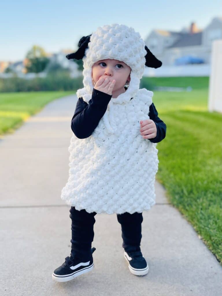 Baby boy in crochet sheep costume