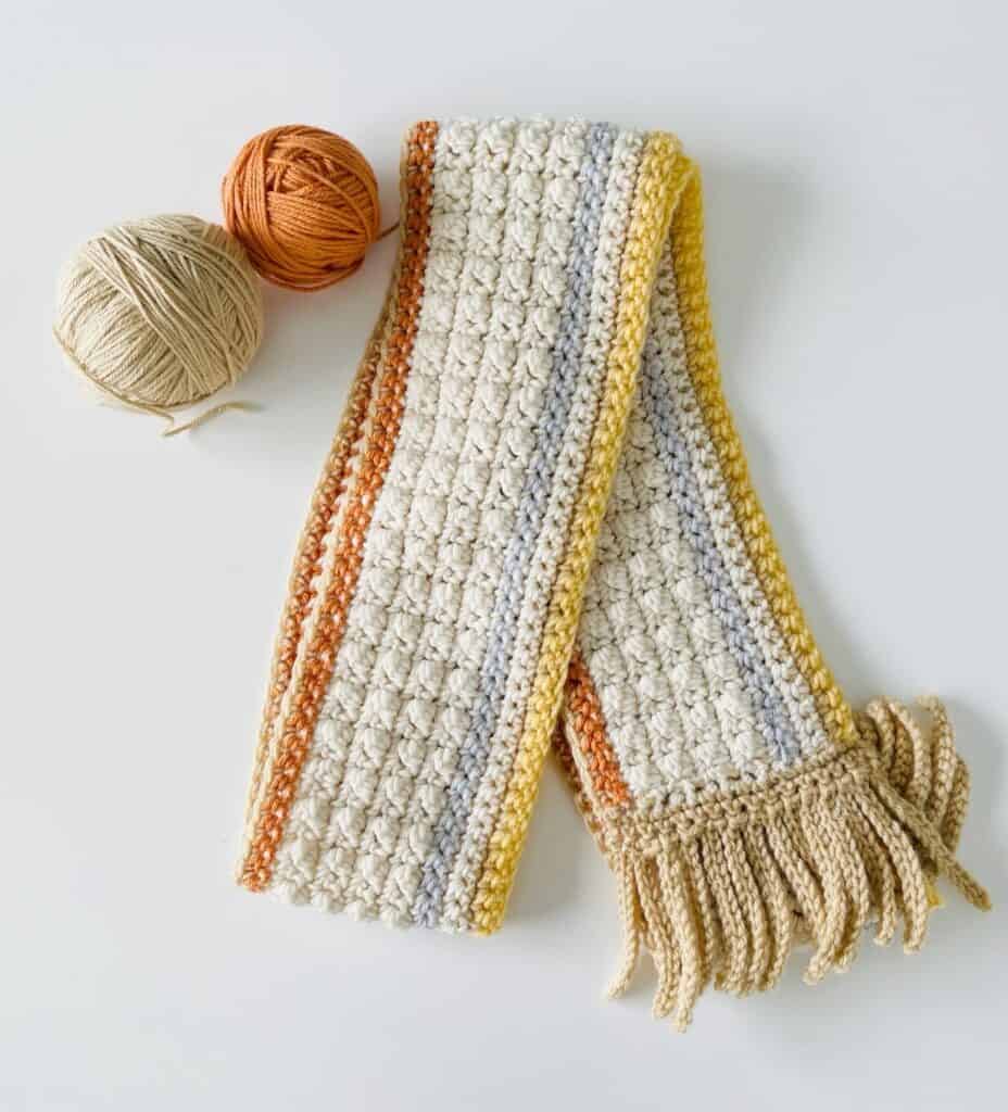 crochet scarf with yarn balls