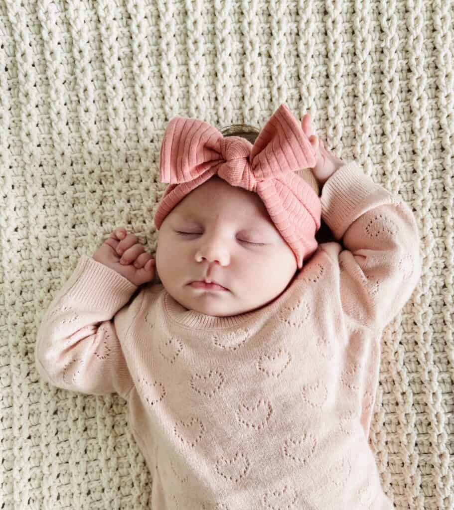 Baby Nora on Ribbed V-Stitch Blanket in Bundle Up