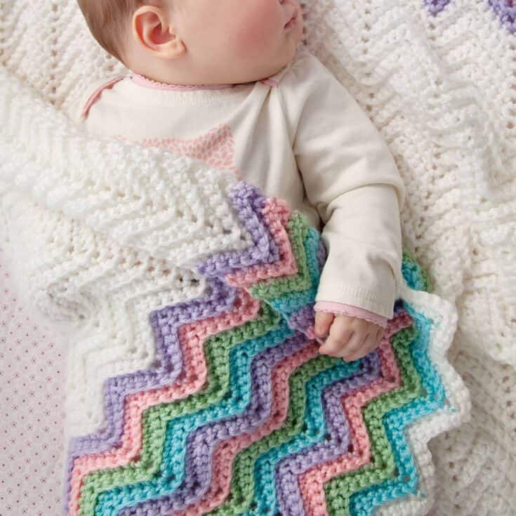 Image for Free Red Heart Rickrack Rainbow Crochet Baby Blanket Pattern