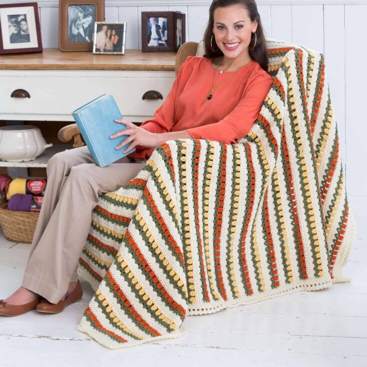 Image for Free Red Heart Flowers In A Row Crochet Blanket Pattern | Yarnspirations